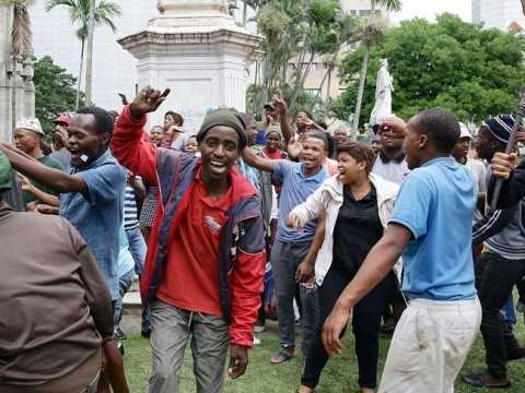 Rising anger ... demonstrators take part in an anti-xenophobia march outside the City Hall of Durban. Picture: AFP Photo / Rajesh Jantila Source: AFP