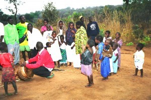 There are times the baby sibling may look bigger that the young girl. This was in a village at Muganda dance in Lundazi in Eastern Zambia in 2002.