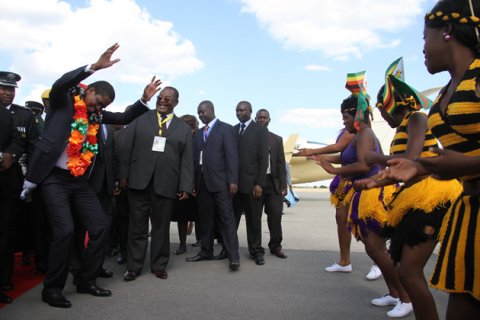 Zambian-President-Edgar-Lungu-dances-with-Mufakose-traditional-dance-group-at-Harare-International-Airport-Pic Credit-Herald