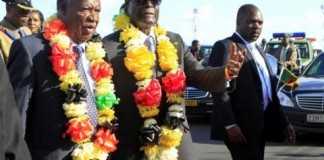 zimbabwe international trade fair-zimbabwe-president robert mugabe walks with zambian president sata - Credit ibtimes.jpg