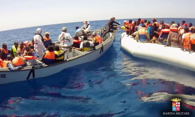 A picture from the Italian navy of one of the migrant rescues. Photograph- Ufficio Stampa Marina Militare : Italian Navy Press Office:Guardian A picture from the Italian navy of one of the migrant rescues. Photograph: Ufficio Stampa Marina Militare / Italian Navy Press Office/Guardian