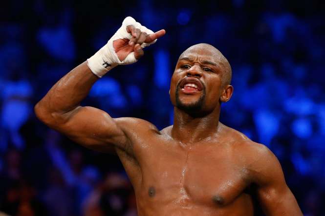 Floyd Mayweather beats Manny Pacquiao in the fight of the century