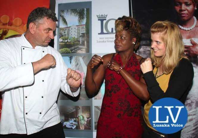 Lusaka Grand Hotel Executive Chef Eric Buitendjik , Boxer Esther Phiri, Lusaka Grand Hotel  Media & Public Relations Manager Janina Baalmann ,