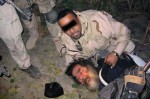This unsourced picture shows ousted Iraqi leader Saddam Hussein being dragged from hiding following his capture by US troops