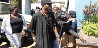 MUSICIAN Chama Fumba, alias Pilato, arriving at Lusaka Central Police yesterday. Picture by CLEVER ZULU