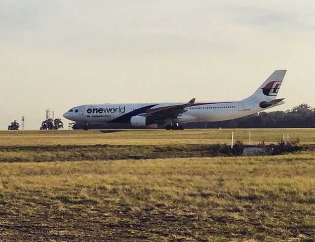 Malaysia Airlines flight MH148 makes emergency landing - MH 140 on the tarmac. Photo- Channel 10:Instagram Malaysia Airlines flight MH148