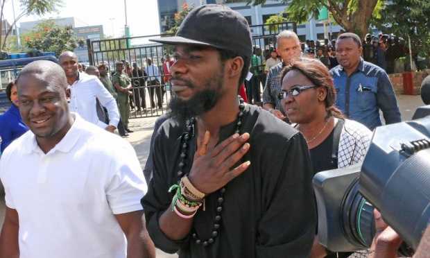 Pilato, Chama Fumba arrives at Lusaka Central police station after police summoned him over his song. Photograph- Chibala Zulu:AFP:Getty Images Pilato, Chama Fumba