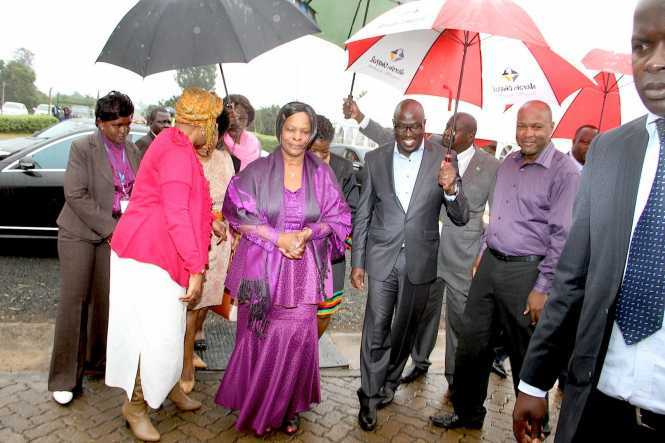 First Lady Esther Lungu flanked by Executive Pastor Rev Nick Korir (second from right) and Pastor Gowi Odera (r) on arrival at Nairobi Chapel for Church service on July 19,2015 -Picture by THOMAS NSAMA