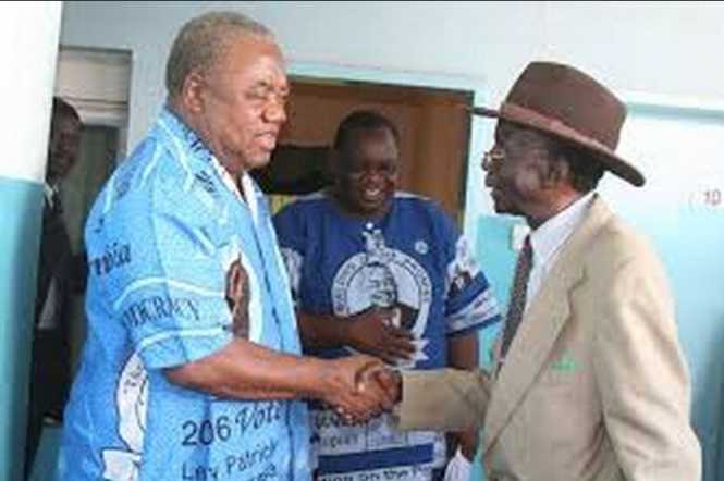Rupiah Banda shakes hands with Senior Chief Kambombo of the Senga people in Chama -Photo Credit Lusaka times Lusaka times