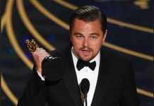 Leonardo DiCaprio accepts the award for best actor in The Revenant