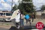 Some guys spotted along Matero- Lilanda carrying a fridge believed to have been looted.  – Lusakavoice.com