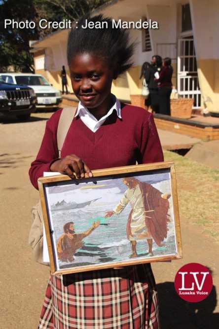 Kabulonga Girl pupil Mary Soteri doing her G12, her work was described as the best by her fellow pupils since it was made out of mosaic, it took her 9 months to complete it.