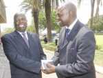 Former Minister of Finance Ngandu Peter Mangande interacting with ZACCI Vice President - Services Dr Chabu Kawesha at the NAZ premises.